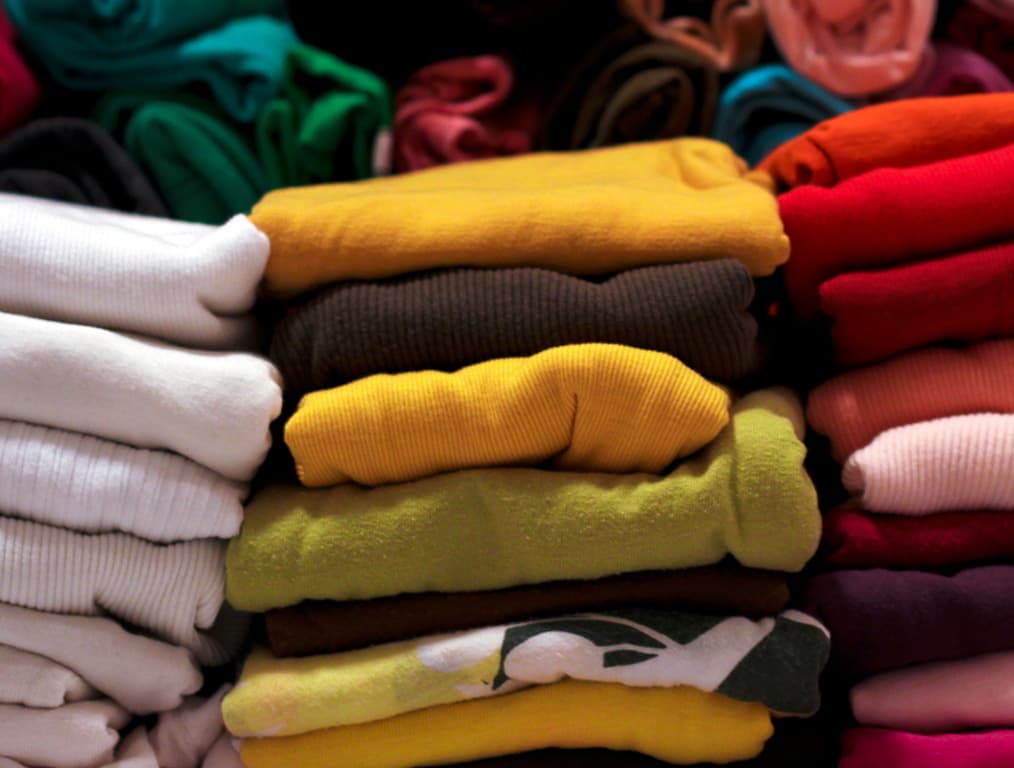 ZigZag, pile of t-shirts 